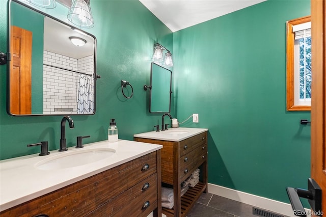 17540 Caribou Dr, Monument, CO 80132 - bathroom featuring tile patterned flooring, two vanities, and curtained shower