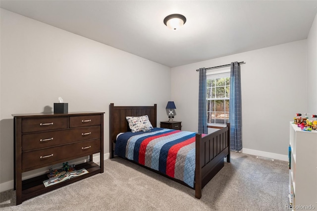 17540 Caribou Dr, Monument, CO 80132 - bedroom with light carpet and baseboards