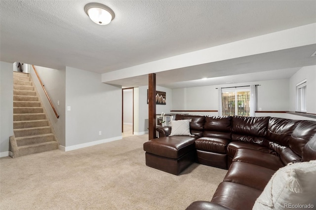 17540 Caribou Dr, Monument, CO 80132 - living room with light colored carpet, stairs, baseboards, and a textured ceiling