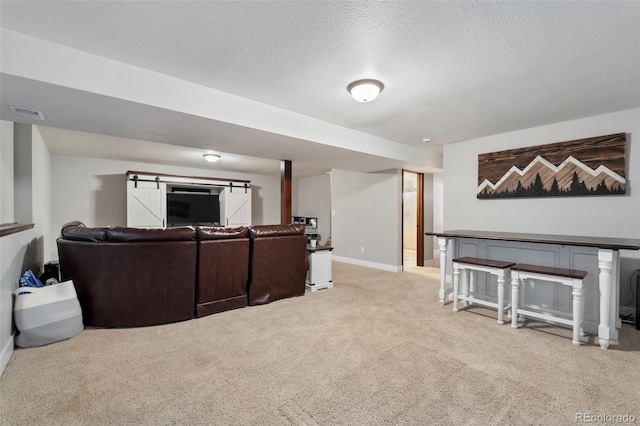 17540 Caribou Dr, Monument, CO 80132 - living area with light carpet, baseboards, and a textured ceiling