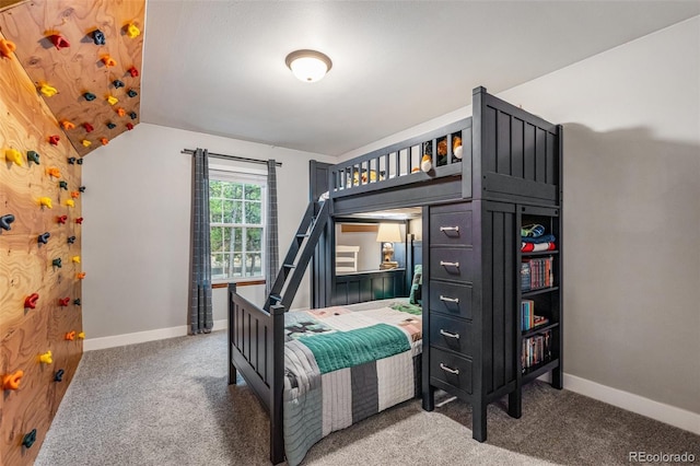 17540 Caribou Dr, Monument, CO 80132 - bedroom featuring carpet flooring, baseboards, and lofted ceiling