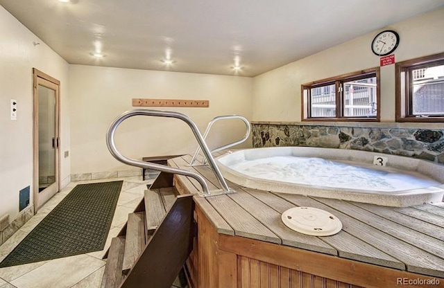 bathroom with tile patterned floors