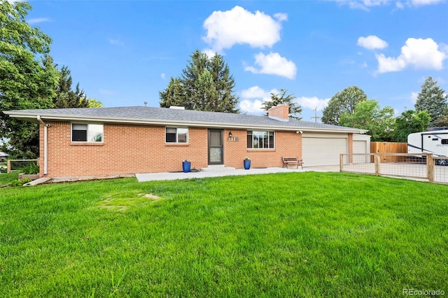 5320 W 62nd Ave, Arvada, CO 80003 - view of front of house with a garage, brick siding, a chimney, and concrete driveway