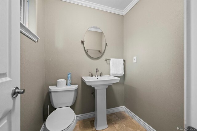 5320 W 62nd Ave, Arvada, CO 80003 - half bathroom featuring crown molding and toilet