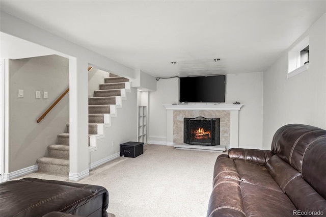 5320 W 62nd Ave, Arvada, CO 80003 - carpeted living room featuring stairs and a tile fireplace