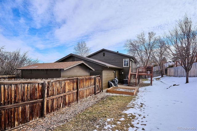 view of snow covered property