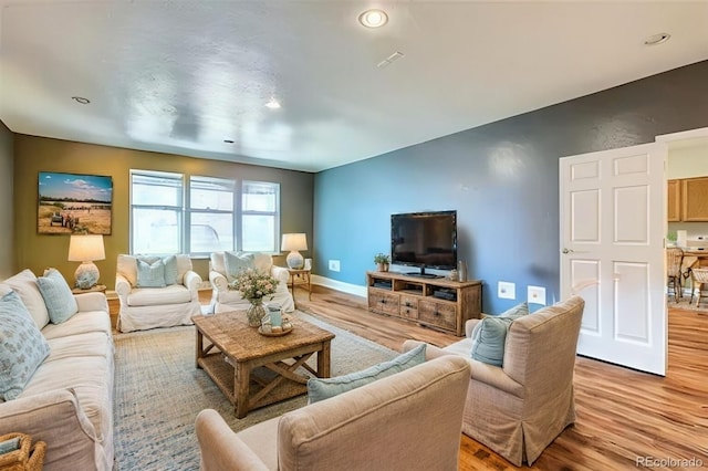 living room with light wood-type flooring