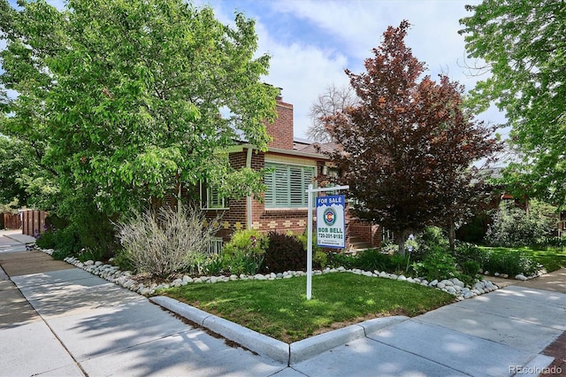 4000 Irving St, Denver, CO 80211 - view of front of property featuring brick siding and a chimney