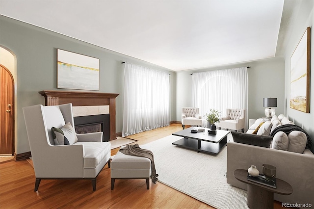 4000 Irving St, Denver, CO 80211 - living area featuring wood finished floors and a tiled fireplace