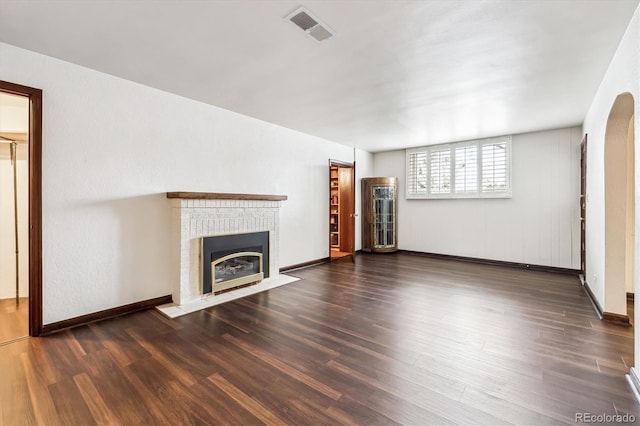 4000 Irving St, Denver, CO 80211 - unfurnished living room featuring wood finished floors, a fireplace, and baseboards