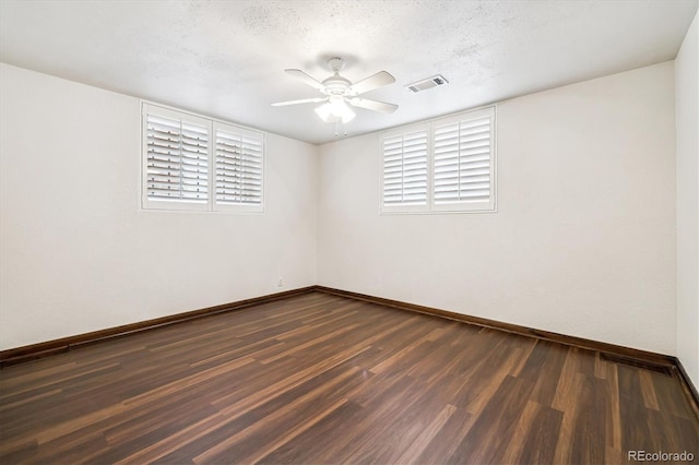 4000 Irving St, Denver, CO 80211 - spare room with baseboards, wood finished floors, ceiling fan, healthy amount of natural light, and a textured ceiling