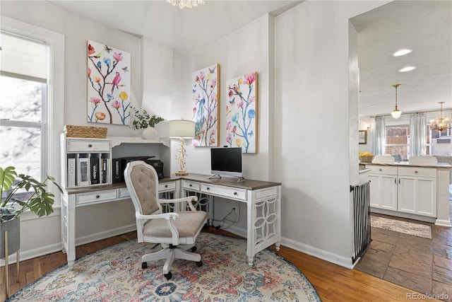 office area featuring recessed lighting, a notable chandelier, baseboards, and wood finished floors