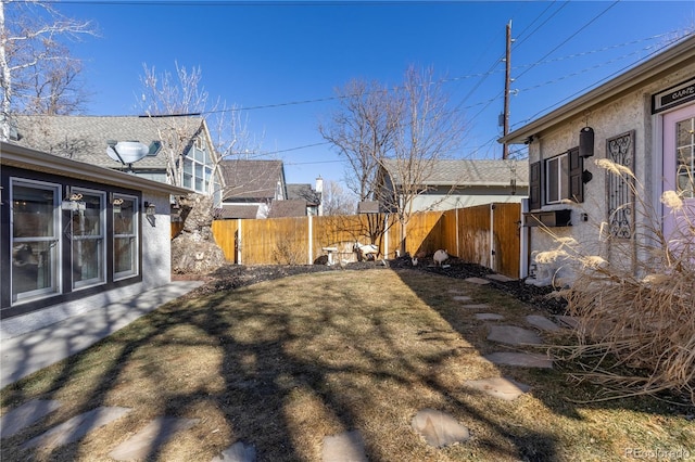 view of yard featuring fence