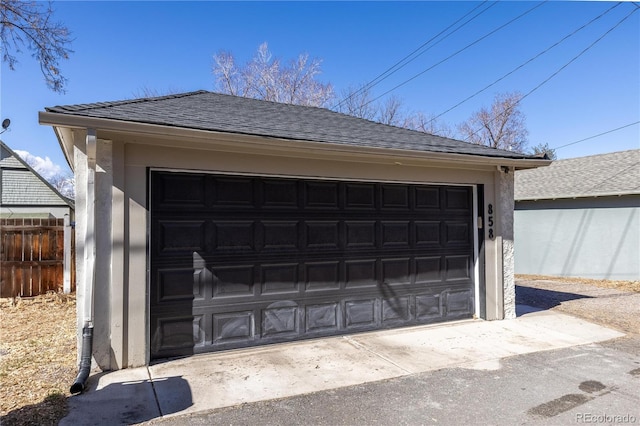 detached garage with fence