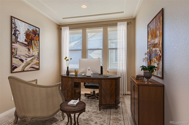 office featuring a healthy amount of sunlight and ornamental molding