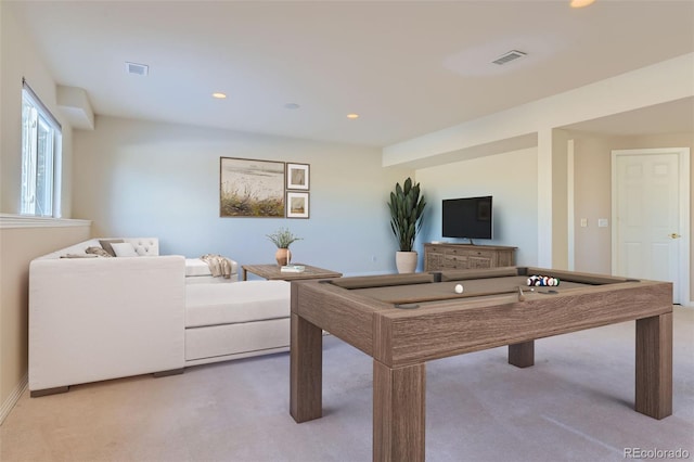 rec room with light carpet, visible vents, and recessed lighting