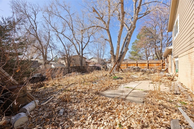 view of yard featuring a patio and a fenced backyard