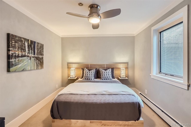 275 Pearl St Unit 11, Boulder, CO 80302 - bedroom featuring carpet floors, a ceiling fan, baseboards, a baseboard heating unit, and ornamental molding