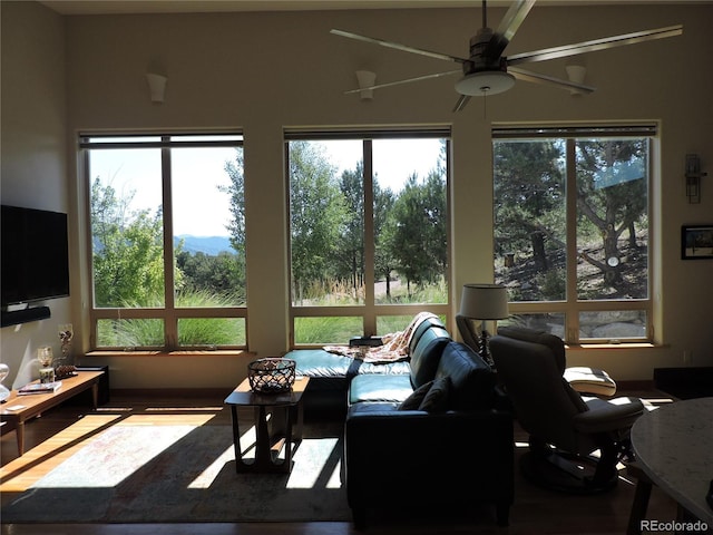 sunroom / solarium with ceiling fan