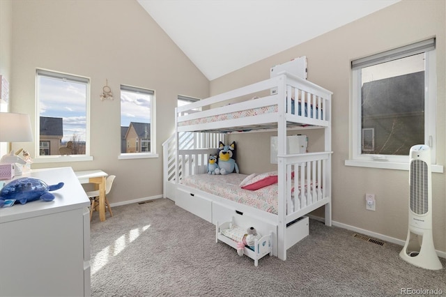 bedroom with baseboards, high vaulted ceiling, visible vents, and light colored carpet