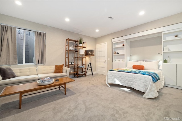 bedroom with light carpet, baseboards, visible vents, and recessed lighting