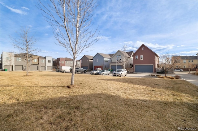 view of yard featuring a residential view