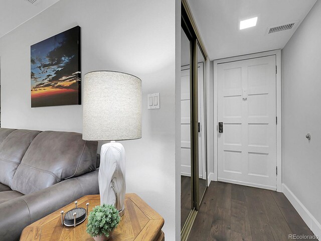 7318 S Xenia Cir Unit B, Centennial, CO 80112 - entrance foyer featuring wood finished floors and baseboards
