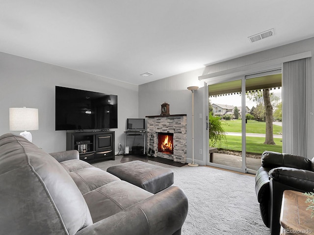 7318 S Xenia Cir Unit B, Centennial, CO 80112 - carpeted living room featuring a fireplace