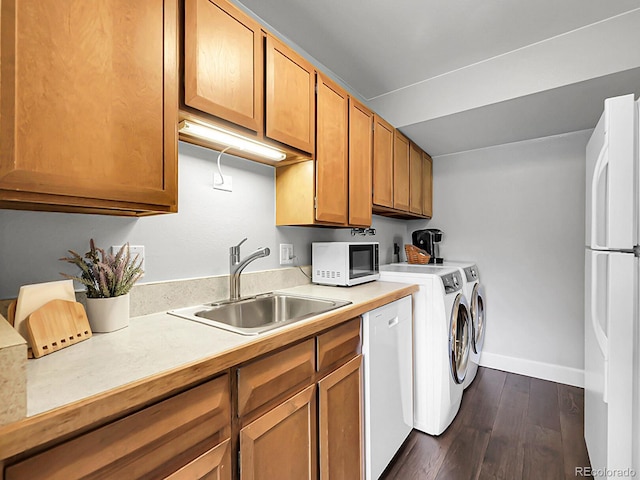 7318 S Xenia Cir Unit B, Centennial, CO 80112 - laundry area with dark wood-style floors and independent washer and dryer