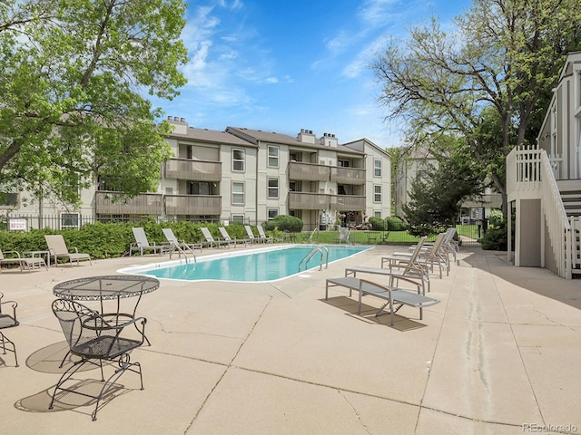 7318 S Xenia Cir Unit B, Centennial, CO 80112 - community pool featuring a patio area