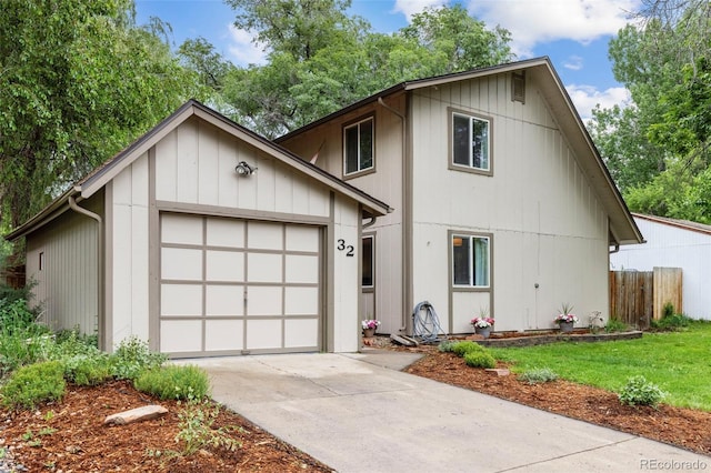 32 Powder Horn Pl, Longmont, CO 80504 - view of front of home with concrete driveway and an attached garage