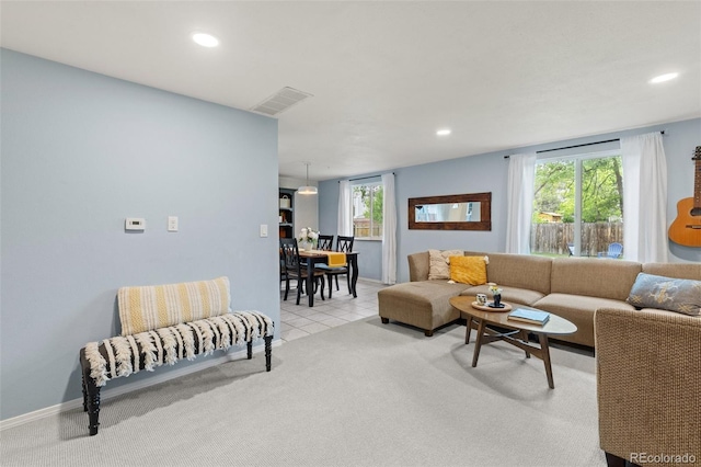 32 Powder Horn Pl, Longmont, CO 80504 - living room with recessed lighting, light colored carpet, and light tile patterned floors