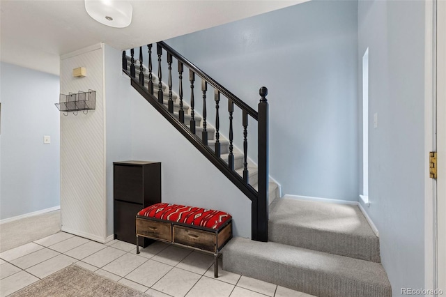 32 Powder Horn Pl, Longmont, CO 80504 - staircase with carpet flooring and tile patterned floors