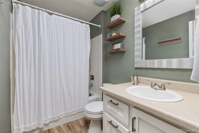 32 Powder Horn Pl, Longmont, CO 80504 - full bathroom featuring vanity, shower / bath combo, and wood finished floors