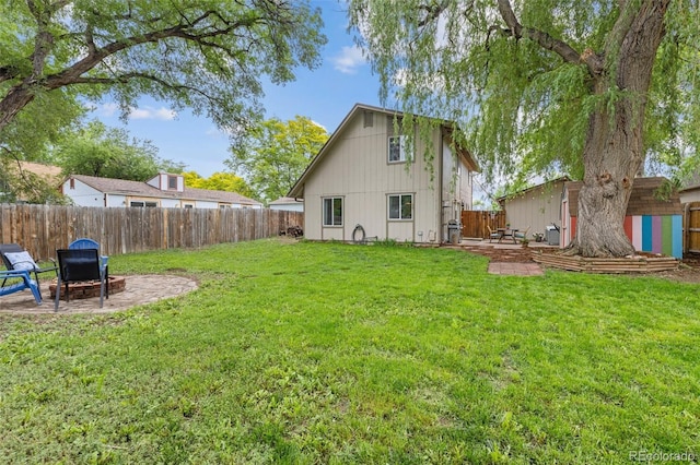 32 Powder Horn Pl, Longmont, CO 80504 - rear view of property with a patio and a fenced backyard