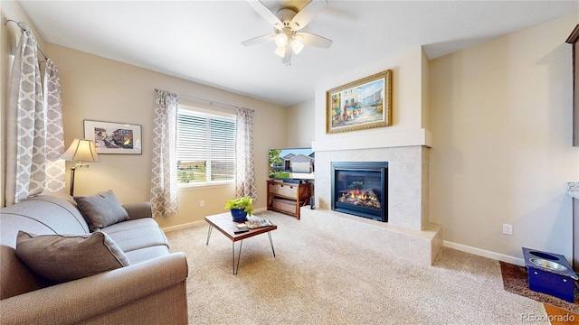 17114 Elati St, Broomfield, CO 80023 - living room featuring a ceiling fan, a tiled fireplace, and carpet floors