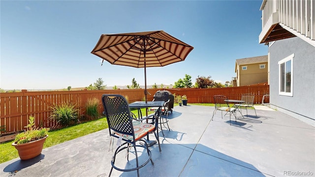 17114 Elati St, Broomfield, CO 80023 - fenced backyard with outdoor dining space and a patio area