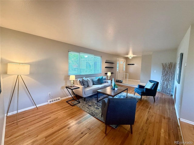 6272 S Garfield Dr, Centennial, CO 80121 - living area with baseboards and wood finished floors