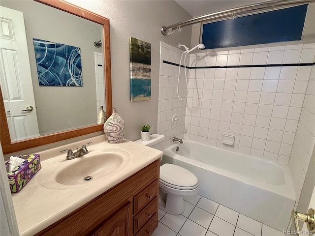 6272 S Garfield Dr, Centennial, CO 80121 - bathroom featuring toilet, tile patterned floors, vanity, and shower / bathtub combination