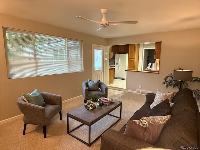 6272 S Garfield Dr, Centennial, CO 80121 - living area with ceiling fan and light colored carpet