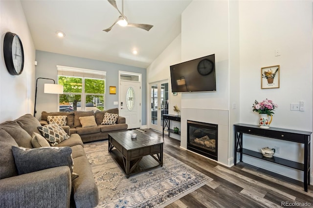 1884 Asoka St, Strasburg, CO 80136 - living area with a ceiling fan, wood finished floors, a fireplace, high vaulted ceiling, and recessed lighting