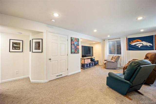 1884 Asoka St, Strasburg, CO 80136 - carpeted living room with recessed lighting and baseboards