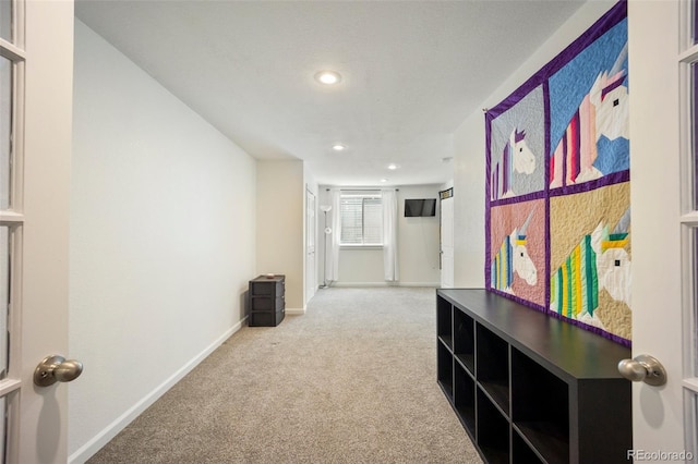 1884 Asoka St, Strasburg, CO 80136 - corridor with carpet flooring and recessed lighting