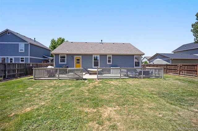1884 Asoka St, Strasburg, CO 80136 - back of house featuring a fenced backyard and a deck