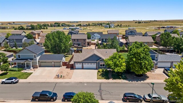 1884 Asoka St, Strasburg, CO 80136 - aerial perspective of suburban area