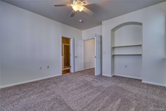 unfurnished bedroom featuring carpet and ceiling fan