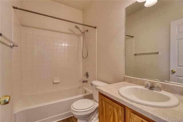 full bathroom featuring vanity, toilet, and shower / bath combination