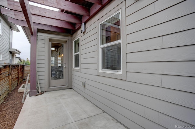 doorway to property with a patio