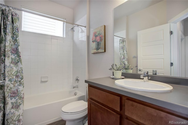 full bathroom with vanity, toilet, and shower / bathtub combination with curtain