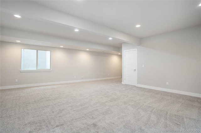 basement with light carpet